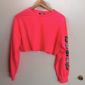 Hot pink crop long sleeve top with butterflies down the sleeve